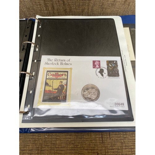 855 - Royal Family album containing collectible coins and first day covers.