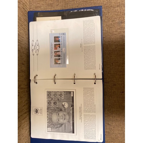 855 - Royal Family album containing collectible coins and first day covers.