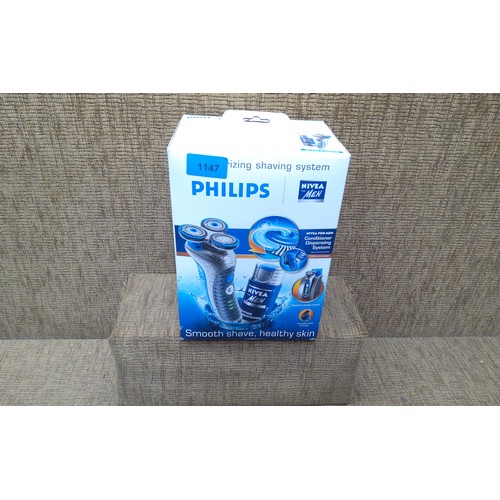 1147 - Philips electric shaving system with docking system. HS2680