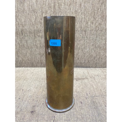 1205 - Large brass shell; 40cm tall.