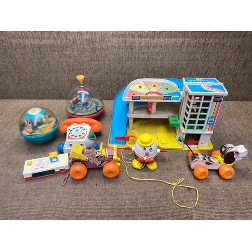 226 - Vintage toys including: Fisher price.