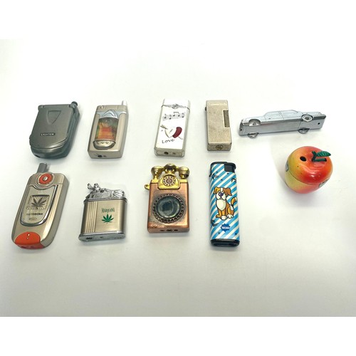 888 - Collection of vintage lighters.