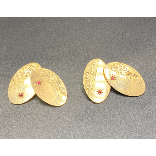 894 - Pair of fine 9ct gold cufflinks with small rubies. 6g.