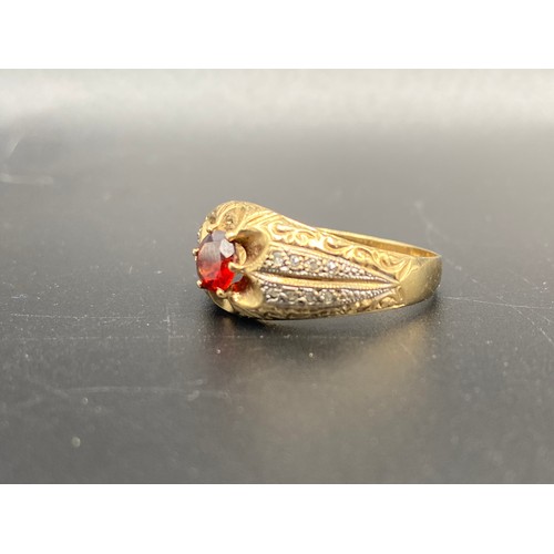 898 - Stunning 9ct gold ring with Diamond shoulder stones and red stone. 4.3g Size Y.