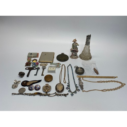 743 - Mixed collectibles including a pocket watch case, GPO stamps, watch keys, silver topped bottle and v... 