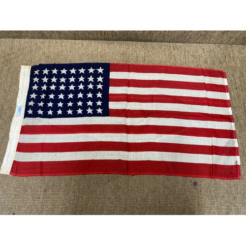 751 - 48-star, American stars and stripes flag. Cloth flag woven cloth and showing signs of age. Markings ... 