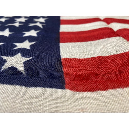 751 - 48-star, American stars and stripes flag. Cloth flag woven cloth and showing signs of age. Markings ... 