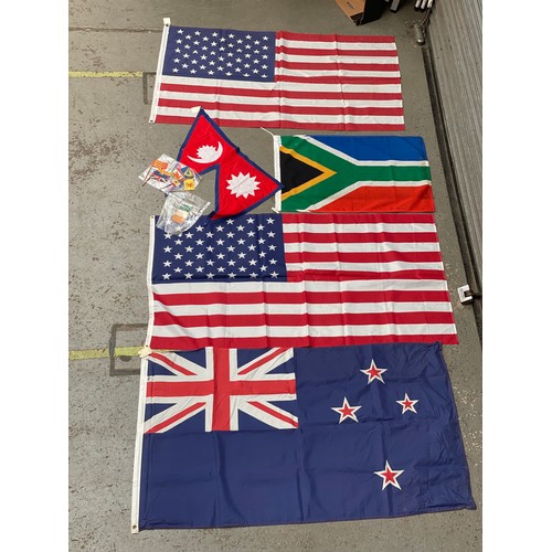 752 - Selection of flags including: United States Of America, United Kingdom and New Zealand.