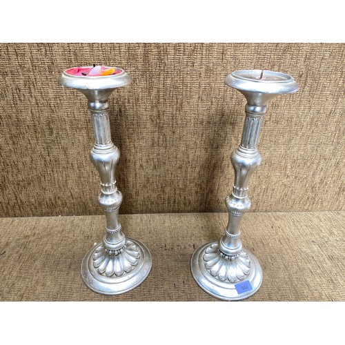 502 - Two large heavy candle sticks. 47cm.