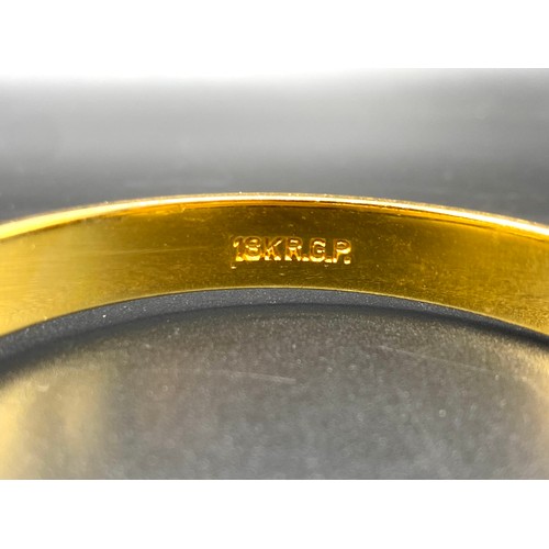 928 - Vintage 18k Rolled gold plated bangle.