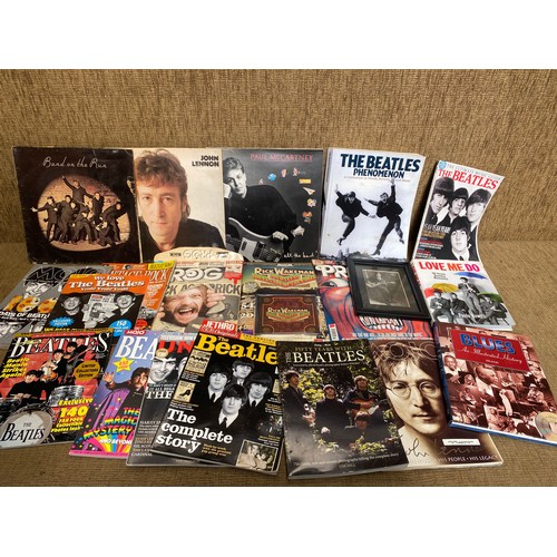 1080D - Selection of The Beatles memorabilia including: A Love me do book.