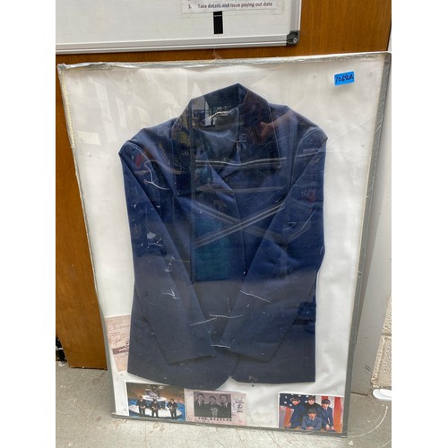 1068A - Framed The Beatles memorabilia jacket from reputed to be from The apple boutique 94 baker street Lon... 