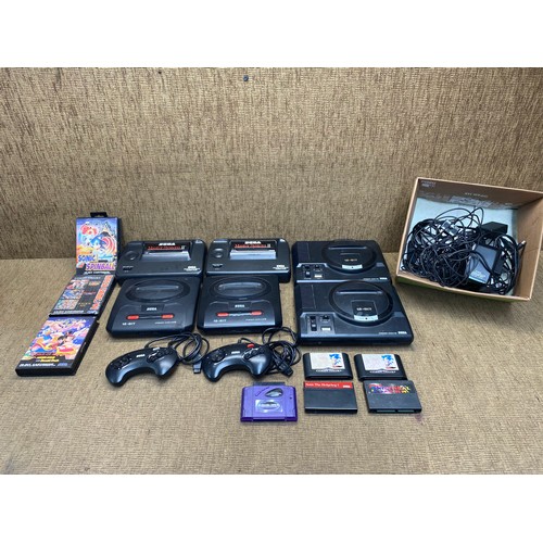 1258 - 2 sega megadrives, 2 sega master systems, 2 sega megadrive II, a selection of games and controllers.