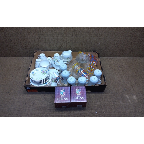 278 - A selection of  cups,  lions mugs, bone China and a cake stand