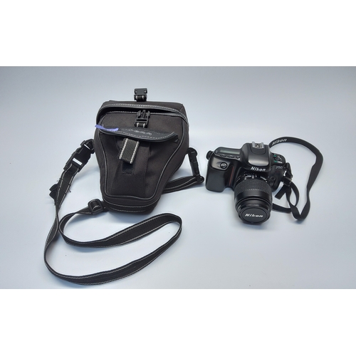 516 - Nikon F50 camera with Cobra protective case