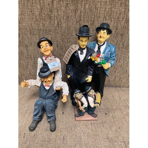 748 - 3 Laurel and hardy figures.