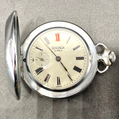 852 - Sekonda 18 jewels USSR pocket watch with pheasant case engraved in as new condition (over wound).