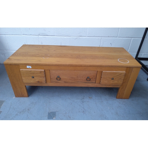 136 - Solid timber coffee table with three drawers 122cm x 47cm x 43cm