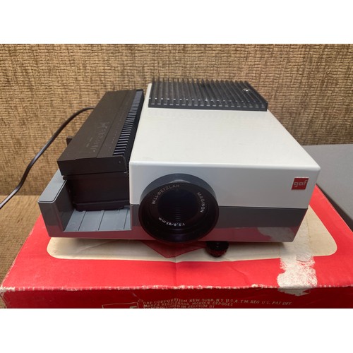 88 - retro projector with slides and a revox tape recorder