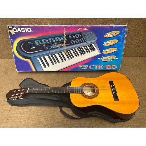 101 - 3/4 size kids Encore flamenco guitar and a Casio CTK-80 electronic keyboard.