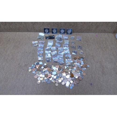 727 - Coins including some silver.