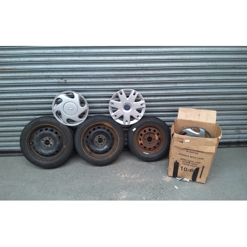 114 - 3 aloy wheels 165 x 65 and a mixture of wheel trims Ford and Nissan