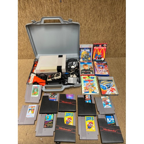 743 - Nintendo NES system 1985 model number NESE-001 and selection of games