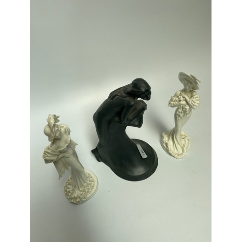 750 - A Royal Doulton Images statue 27cm high and two Compton and woodhouse statues