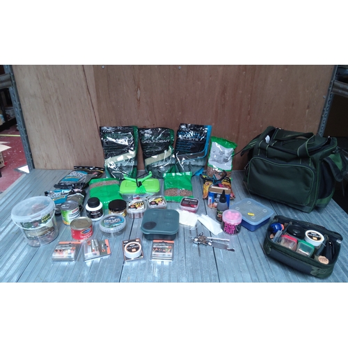 574 - Large amount of fishing baits including bait boxes and a bait bag