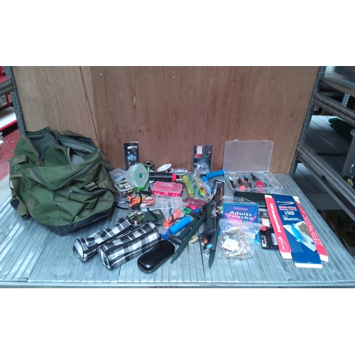 584 - Fishing bag and large quantity of tackle