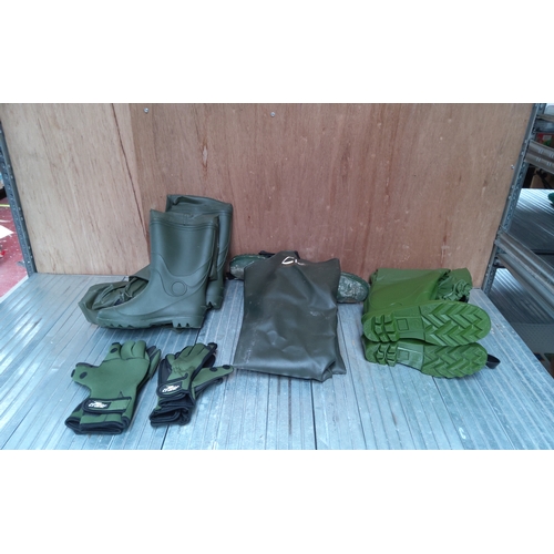 588 - Two pairs of waders size 8, a pair of chest waders size 8 and two pairs of gloves