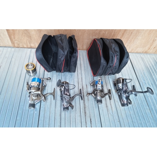 592 - Four Crivit fishing reels with cases