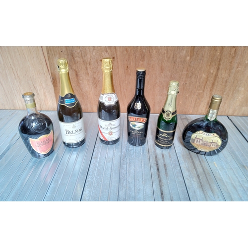 201 - Six bottles of alcohol including Baileys and Mateus rose