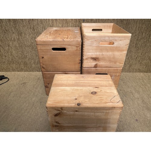 250 - 5 stackable wooden storage boxes.