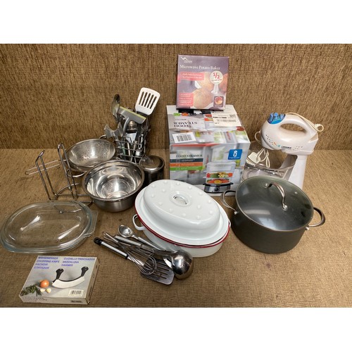 258 - Large collection of kitchen items including: A steamer and mixer.