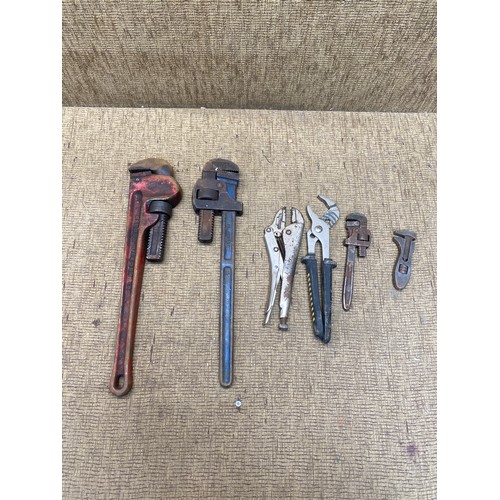 284 - Two large record pipe wrenches and some smaller ones