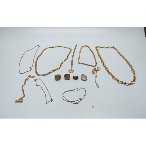 468 - A collection of gold coloured chains and three brass rings Two stamped 18k 750