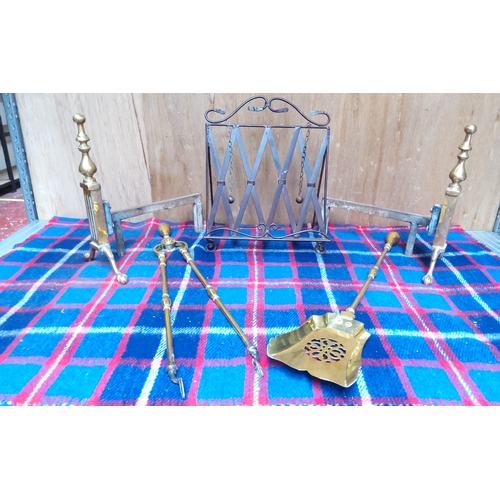 475 - Large brass coal shovel and tongs with two fireside dogs and a book stand