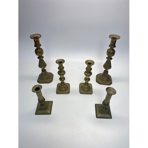 484 - 6 brass candle holders.