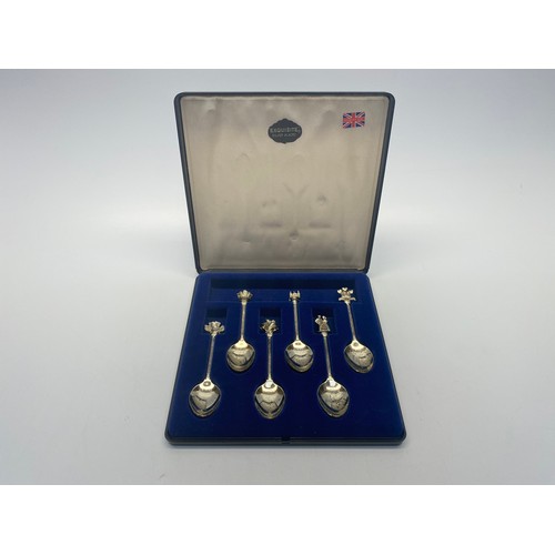 497 - Silver plated spoon set.