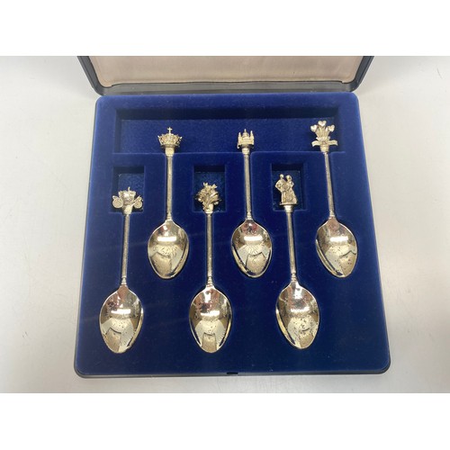 497 - Silver plated spoon set.