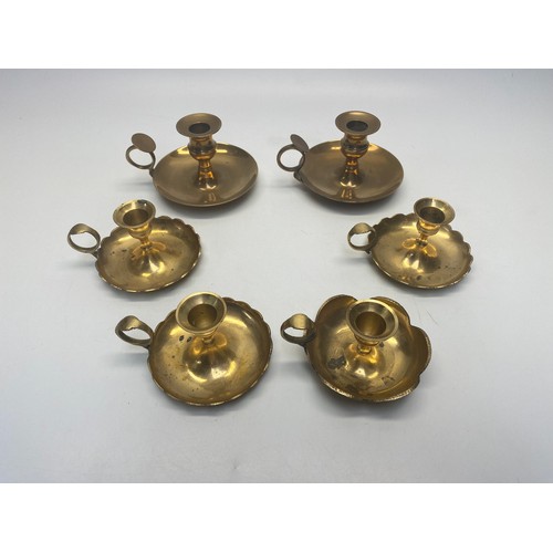 498 - 6 brass candle holders.