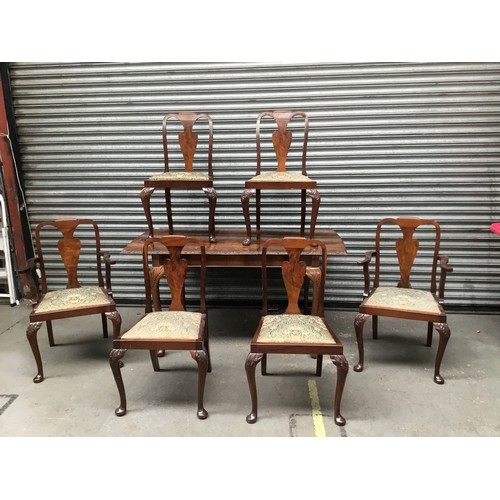 191 - Mid-century veneered oak dinning table and 6 chairs with two carvers.