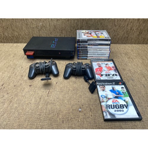 255 - PlayStation 2 with 9 games including: Tony Hawk Pro Skater 4.