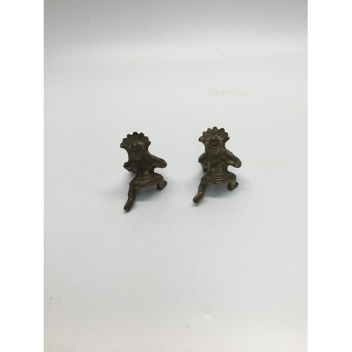 713 - Two small brass figures or the Hindu god Tribal Bal Gopal, Child Krishna. 8cm.