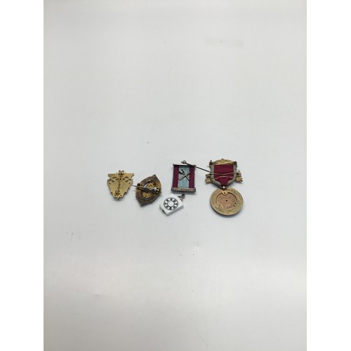 864 - Four sterling silver, enamel and gold gilt Masonic badges and Jewels.