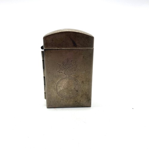 869 - WW1 German cap lighter with a grenadier regimental crest on the side. on base D.R.P.A R.6900