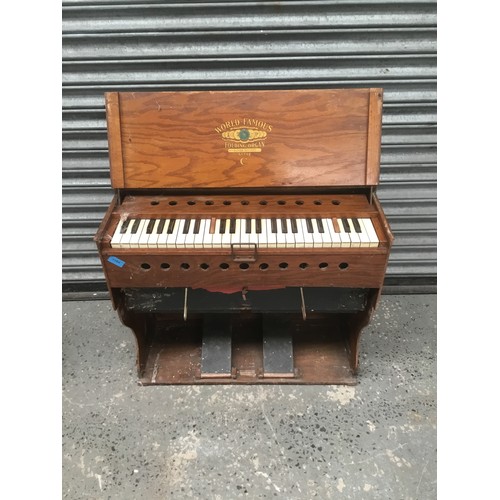 1164 - Antique world famous folding organ.