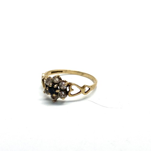 925 - 9ct gold ring with synthetic Carbonado stone and heart shoulders. Size O. 1.3g.