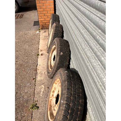 200 - Set of four Landrover series 3 wheels and tyres. 5.50f x 16 x33 with 205/80/r16 tires.
